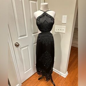 Elegant Black Halter Midi Dress with Embroidered Detail cutouts and overlays